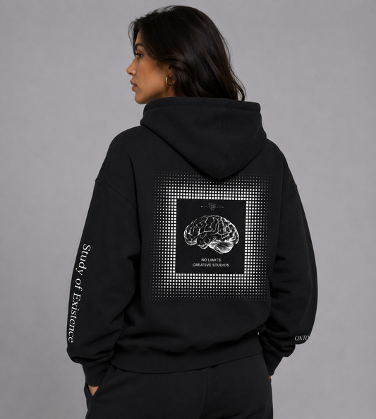 Person wearing a black hoodie with a brain graphic and text on the back, on a gray background. Stylist streetwear hoodie, comfy formal hoodie, fashion hoodie, graphic hoodie, no front pocket hoodie, large hooded hoodie, large hood hoodie, oversized hoodie