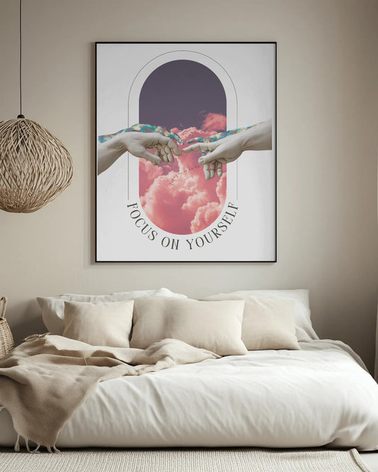 Framed artwork above a bed with 'Focus on Yourself' text in a bedroom setting