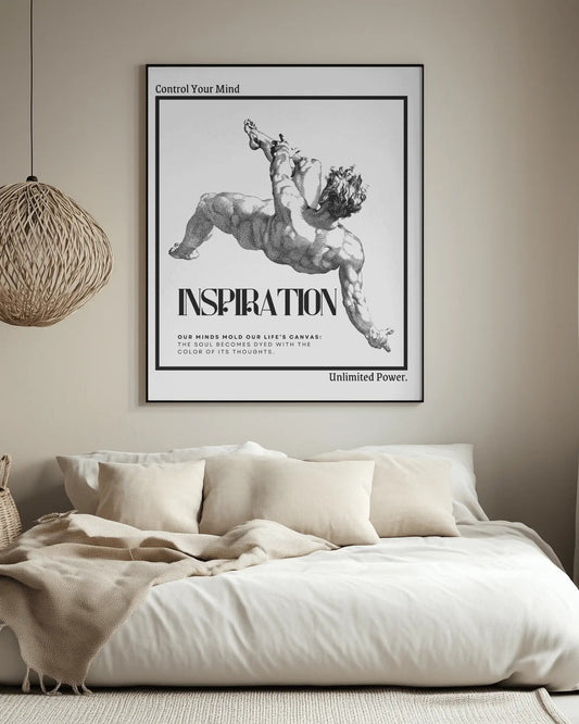 Framed artwork above a bed with motivational text in a bedroom setting