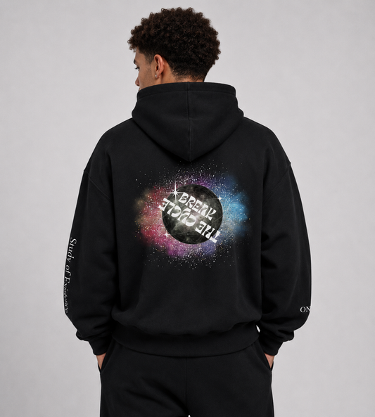 Person wearing a black hoodie with a colorful graphic on the back against a gray background. Stylist streetwear hoodie, comfy formal hoodie, fashion hoodie, graphic hoodie, no front pocket hoodie, large hooded hoodie, large hood hoodie, oversized hoodie