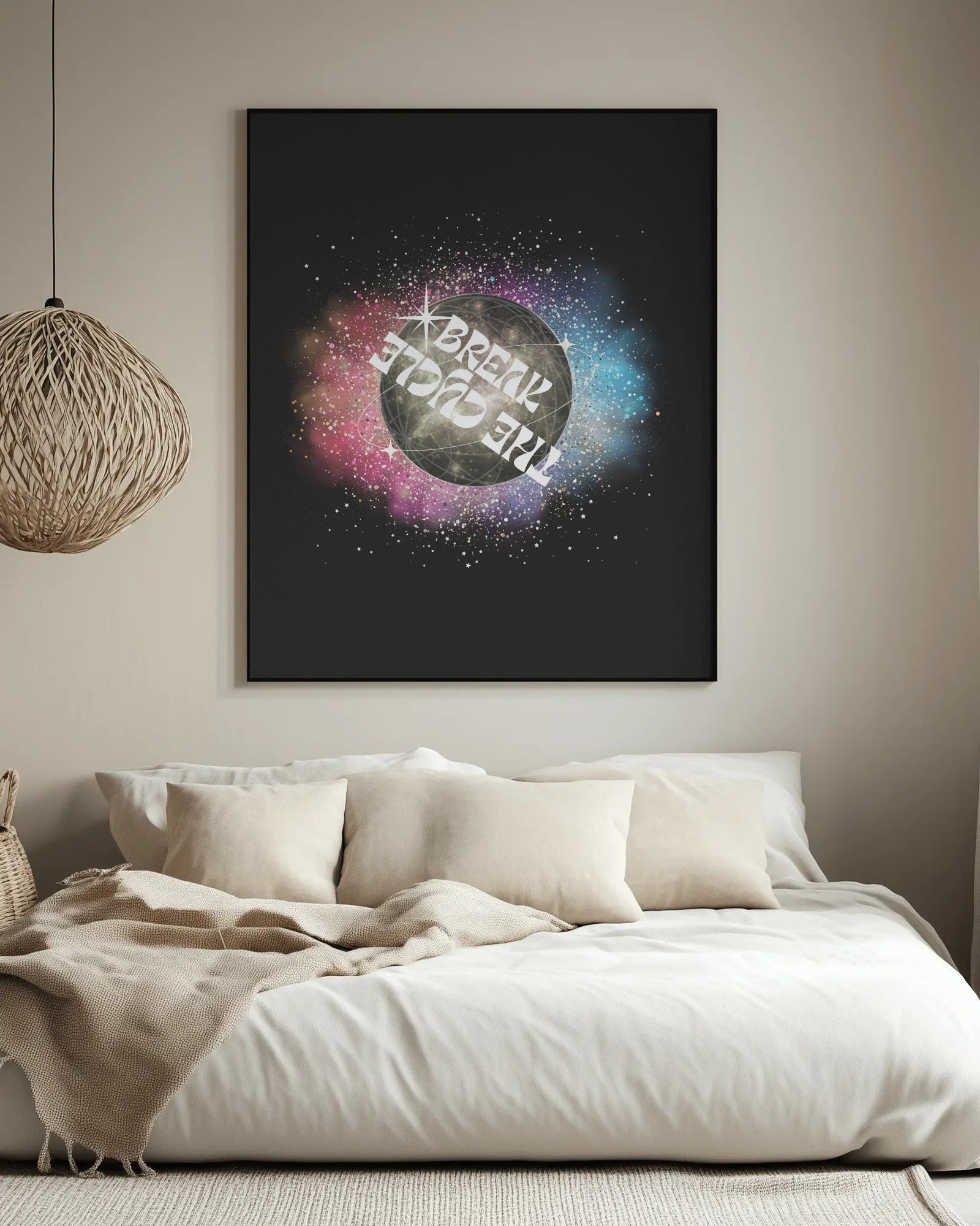 Framed artwork with a cosmic design and text above a bed in a bedroom.
