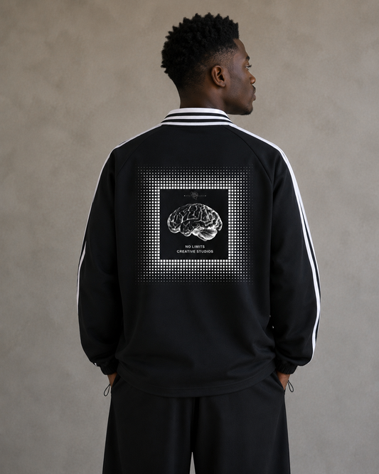 Person wearing a black tracksuit with a brain graphic on the back against a beige background. Man wearing Black jacket with white stripes on sleeves and back design featuring a brain illustration. Stylist streetwear collar Sweatshirt, comfy formal collar Sweatshirt, fashion collar Sweatshirt, graphic collar Sweatshirt