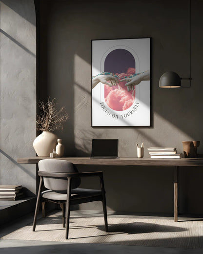 Modern office space with a desk, chair, and framed artwork on the wall.