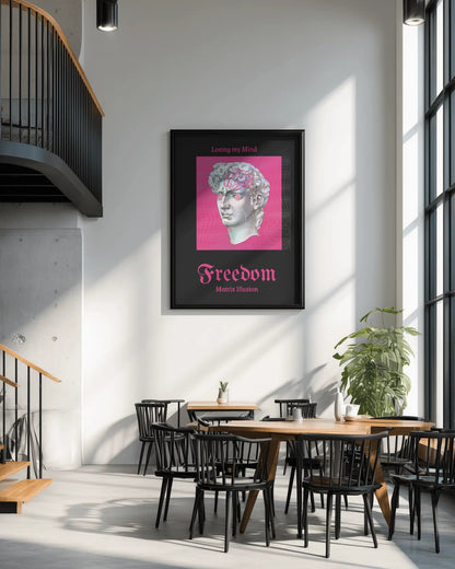 Framed artwork with a pink background and text on a wall in a modern interior setting.
