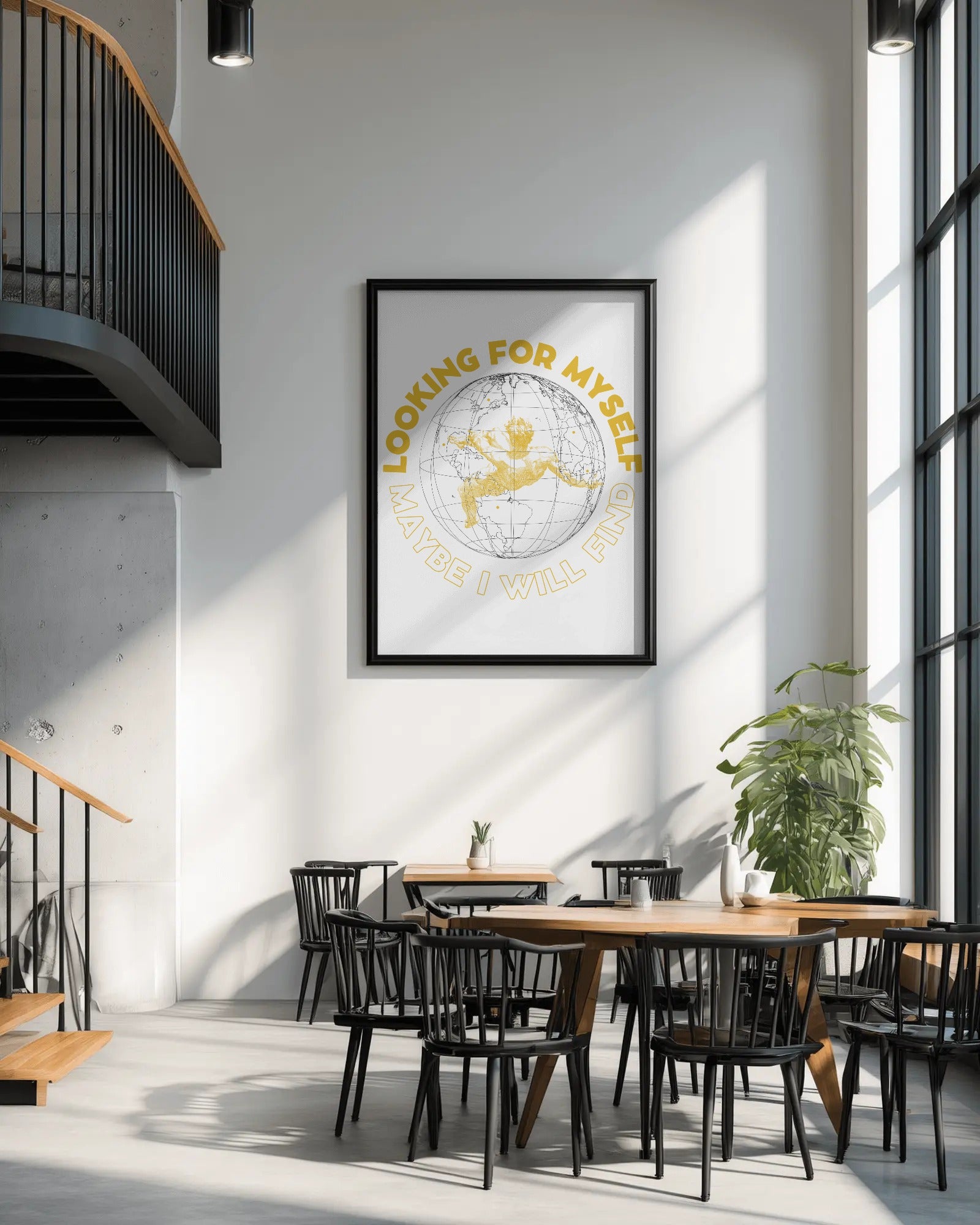 Modern interior with a framed artwork on the wall, tables, and chairs.