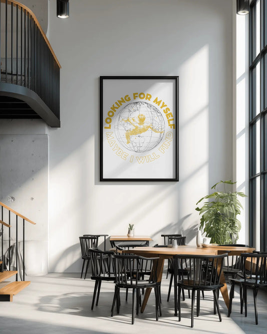 Modern interior with a framed artwork on the wall, tables, and chairs.