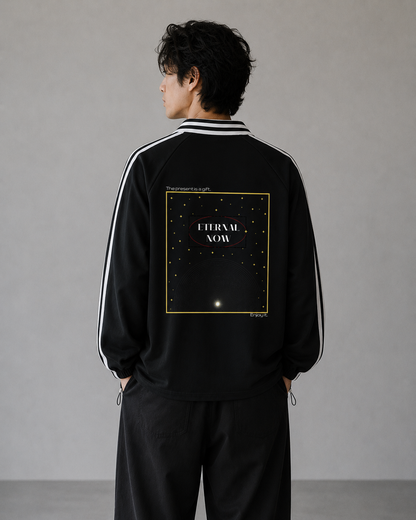 Person wearing a black tracksuit with a design on the back against a gray background. Stylist streetwear collar Sweatshirt, comfy formal collar Sweatshirt, fashion collar Sweatshirt, graphic collar Sweatshirt