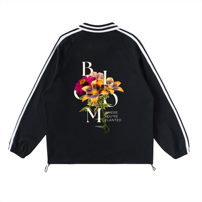 Black jacket with floral design and text on a white background