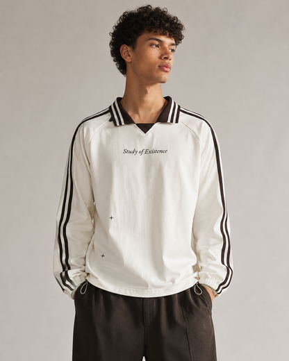 Man wearing a white sports jacket with black stripes and text on a plain background. Stylist streetwear collar Sweatshirt, comfy formal collar Sweatshirt, fashion collar Sweatshirt, graphic collar Sweatshirt