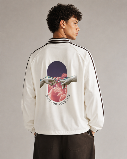 Person wearing a white jacket with a graphic design on the back against a neutral background. Stylist streetwear collar Sweatshirt, comfy formal collar Sweatshirt, fashion collar Sweatshirt, graphic collar Sweatshirt