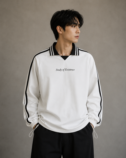 Person wearing a white sweatshirt with black accents and text on a plain background.Stylist streetwear collar Sweatshirt, comfy formal collar Sweatshirt, fashion collar Sweatshirt, graphic collar Sweatshirt