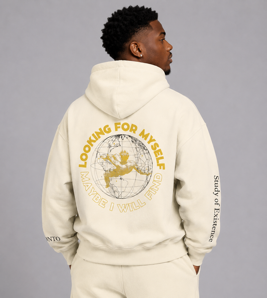 Person wearing a beige hoodie with text and graphics on the back against a gray background. Stylist streetwear hoodie, comfy formal hoodie, fashion hoodie, graphic hoodie, no front pocket hoodie, large hooded hoodie, large hood hoodie, oversized hoodie