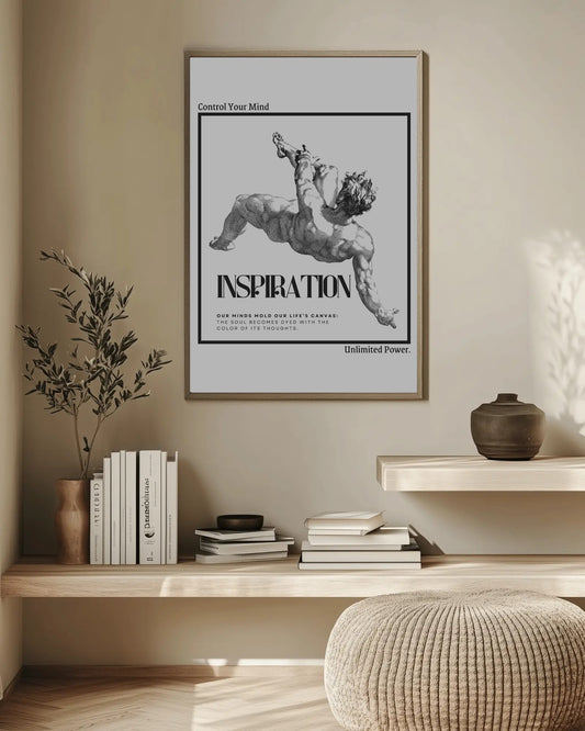 Framed poster with motivational quote on a wall above a wooden shelf with decor items.