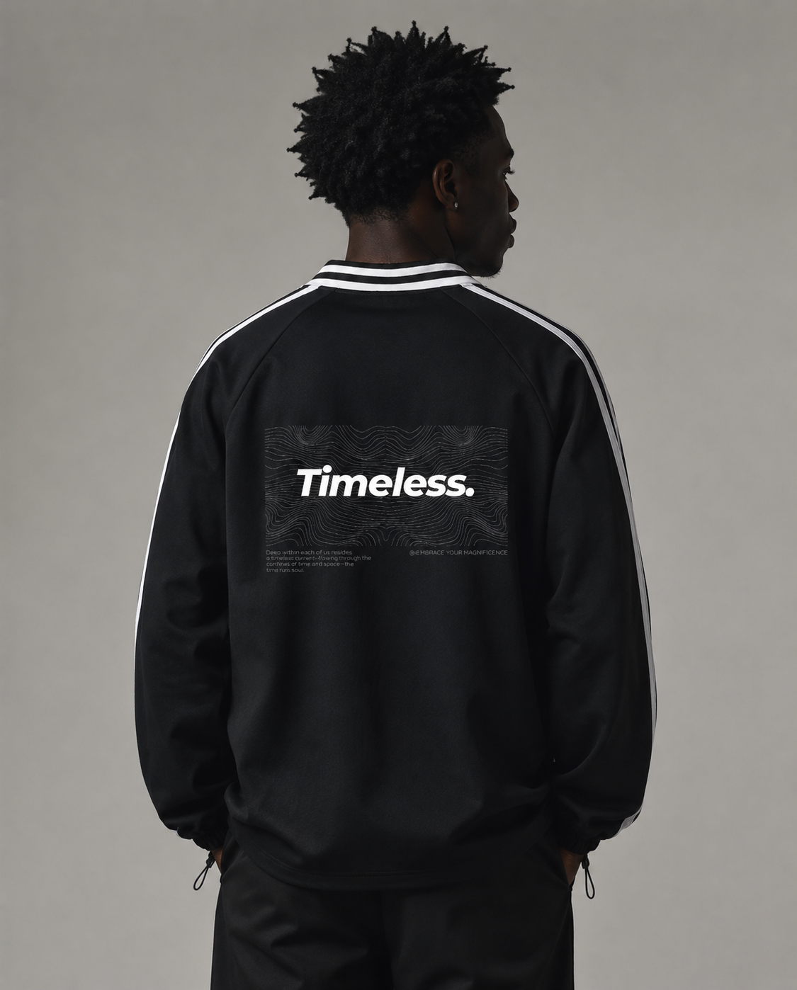 Person wearing a black jacket with 'Timeless.' text on the back against a gray background. Stylist streetwear collar Sweatshirt, comfy formal collar Sweatshirt, fashion collar Sweatshirt, graphic collar Sweatshirt
