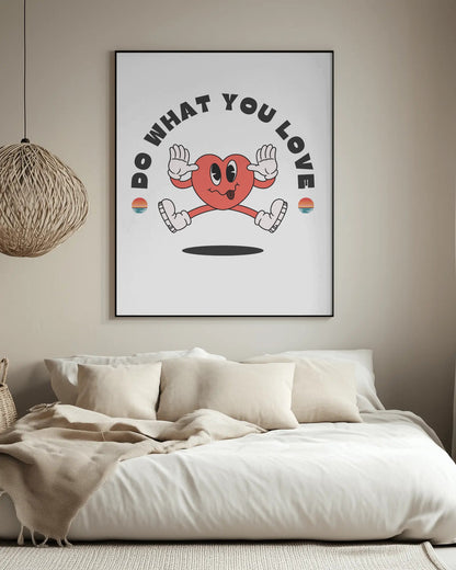 Framed poster with a heart character and 'Do What You Love' text in a living room.