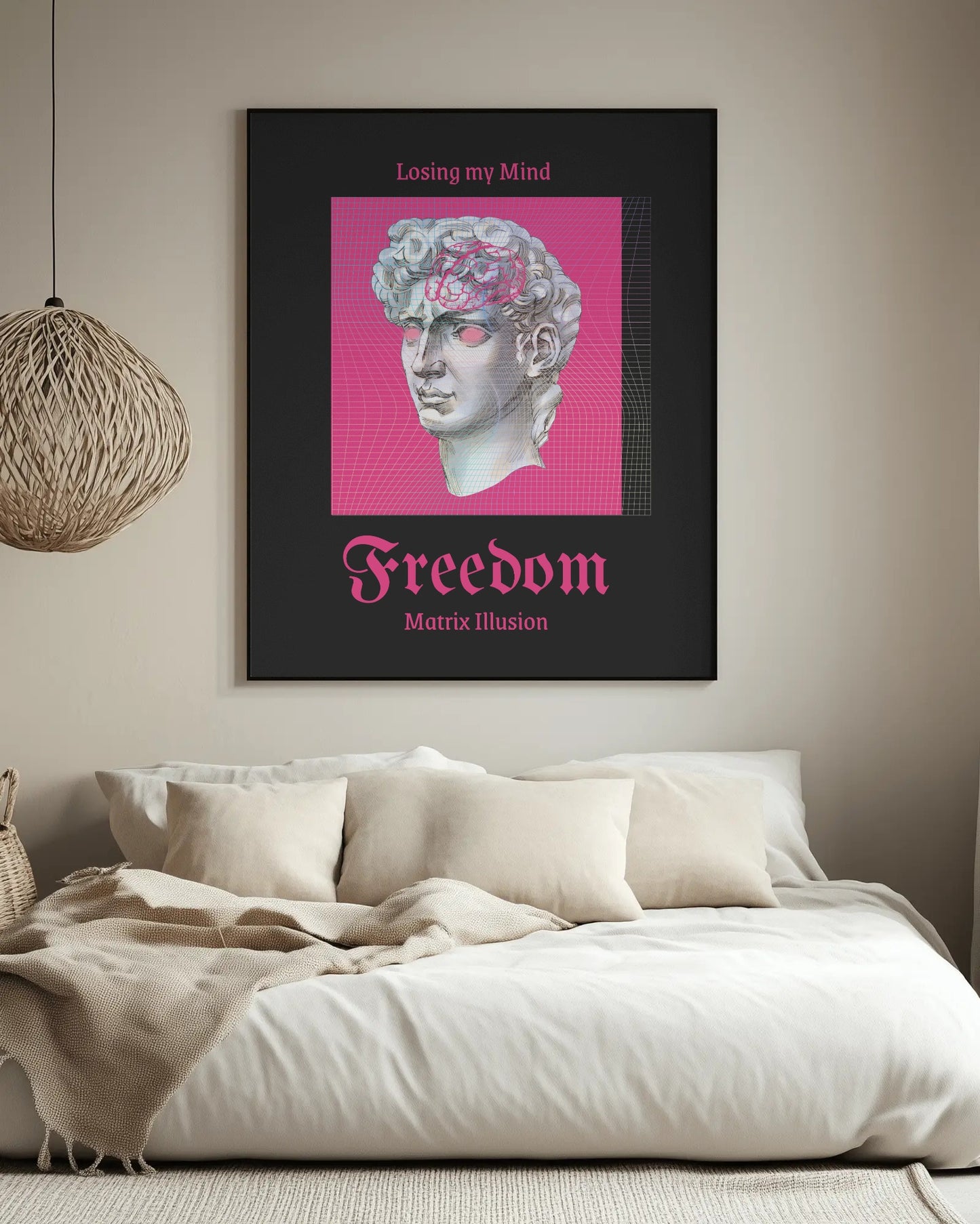 Framed artwork with a pink background and text on a wall above a bed.