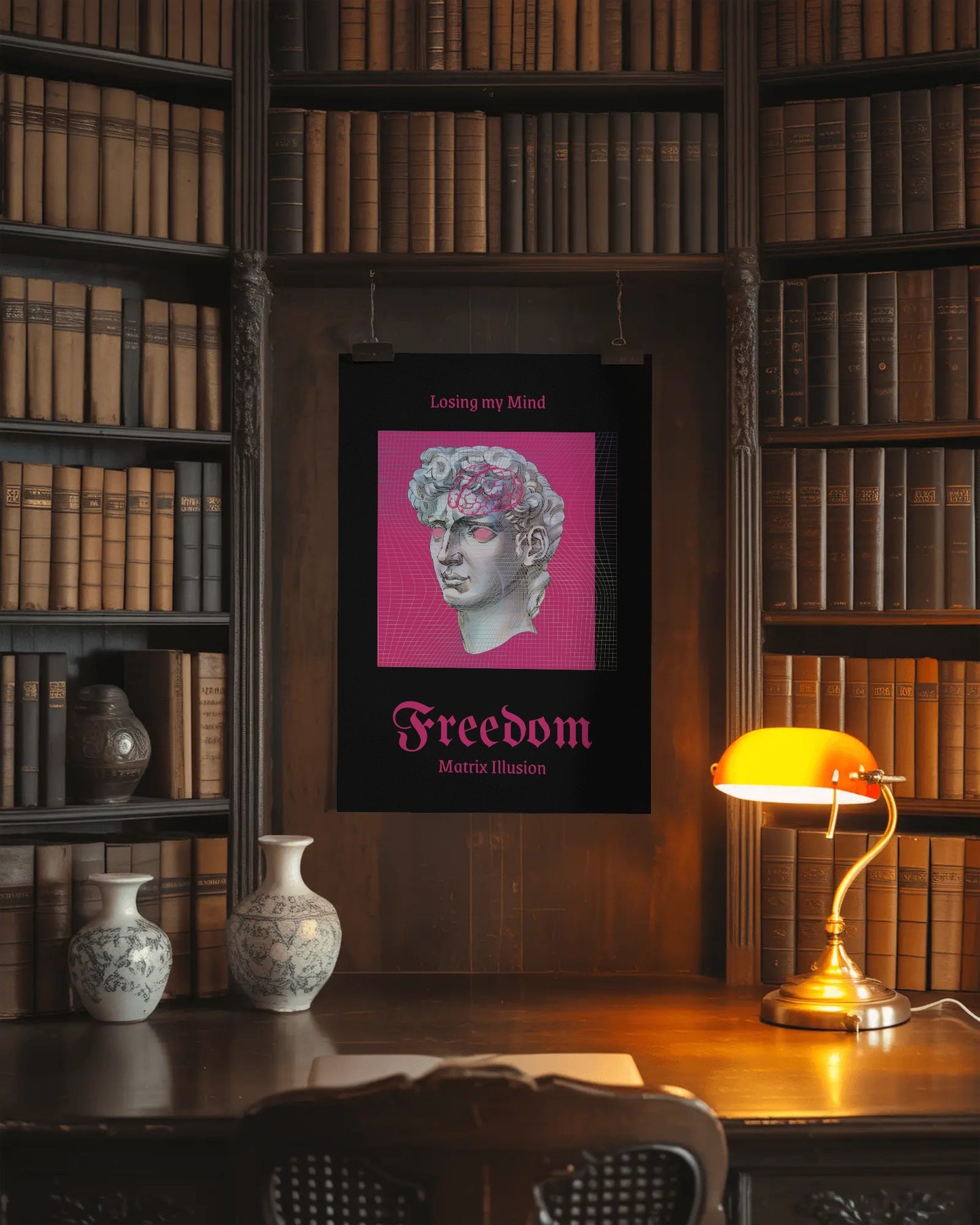 Framed artwork with a pink background and text on a wooden desk in a library setting.