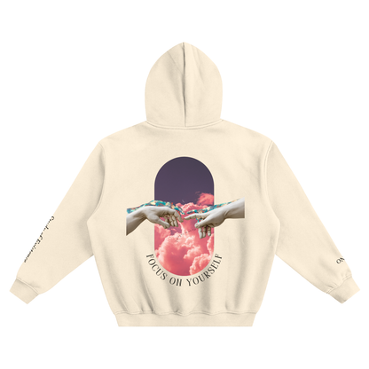 Beige hoodie with a graphic of hands reaching towards each other and the text 'Focus on Yourself' on a white background.