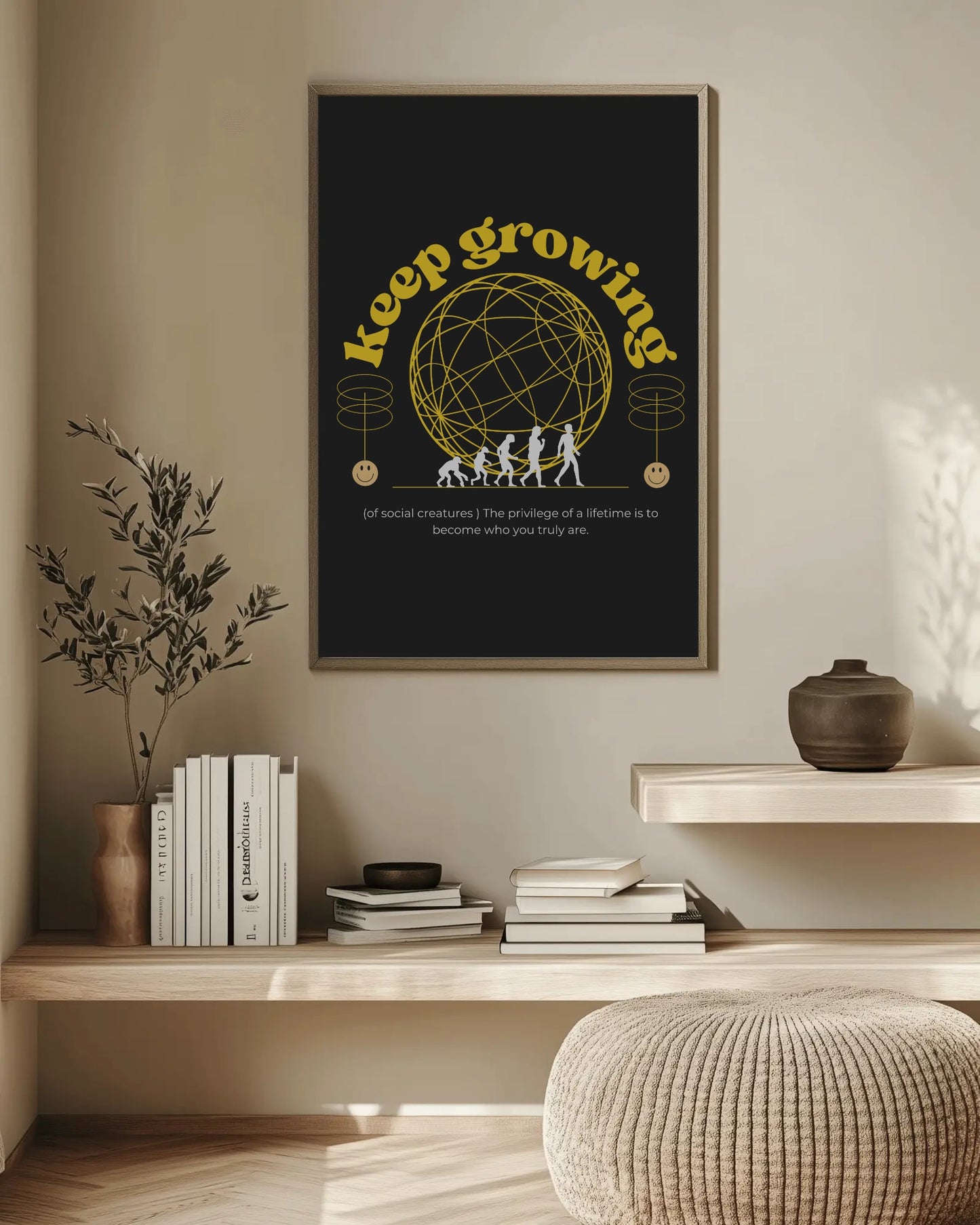 Framed 'keep growing' poster on a wall above a wooden shelf with books and decor.