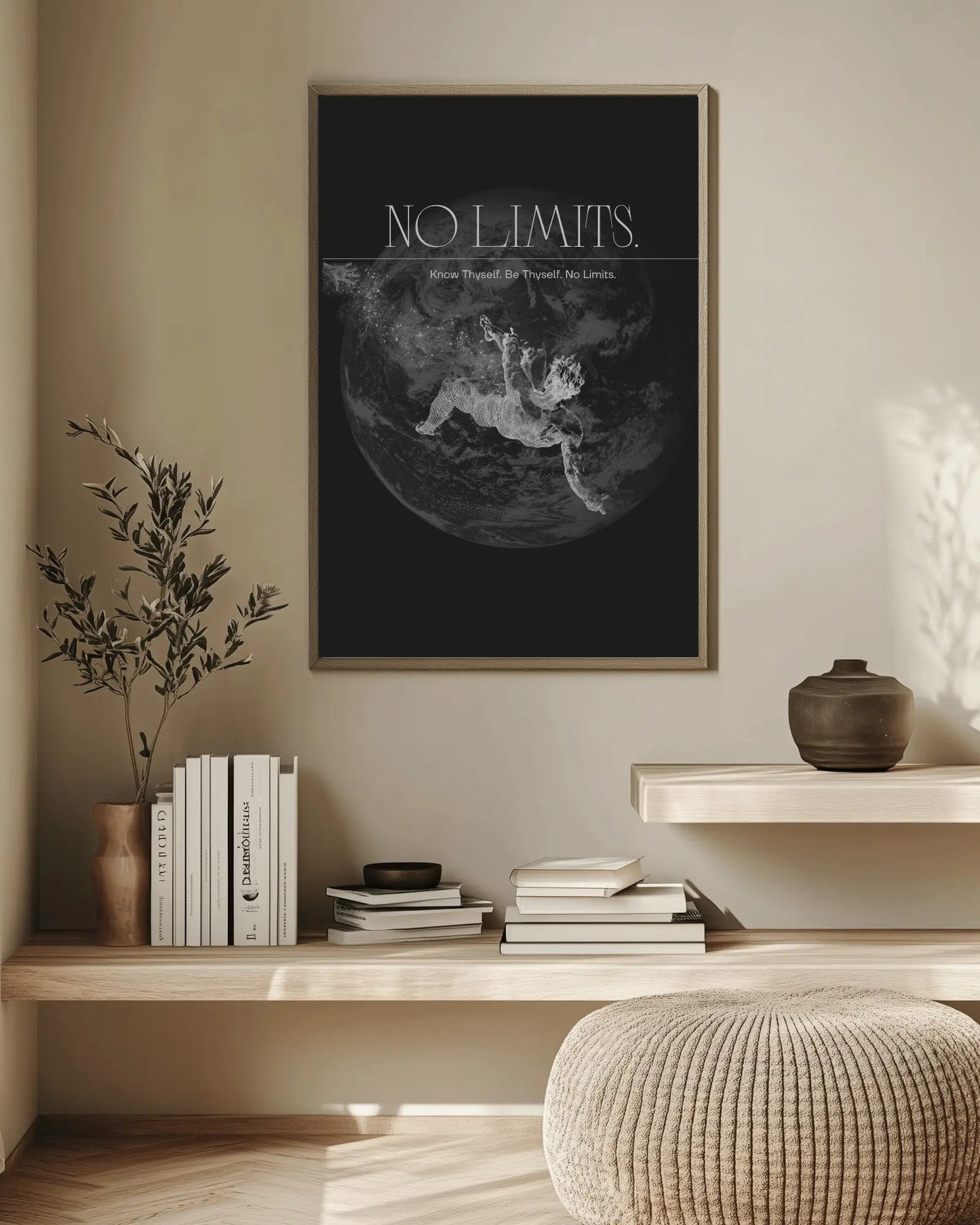 Framed poster with 'No Limits' text on a wall above a wooden shelf with books and decor.