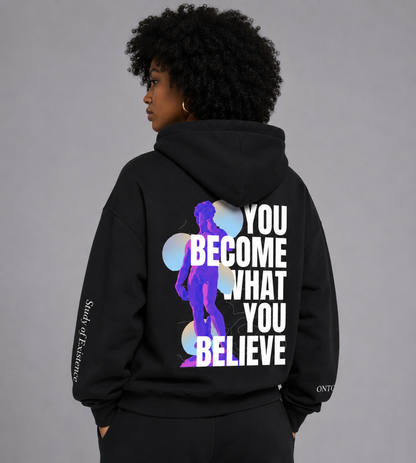 Person wearing a black hoodie with motivational quote and silhouette design on a gray background. Stylist streetwear hoodie, comfy formal hoodie, fashion hoodie, graphic hoodie, no front pocket hoodie, large hooded hoodie, large hood hoodie, oversized hoodie